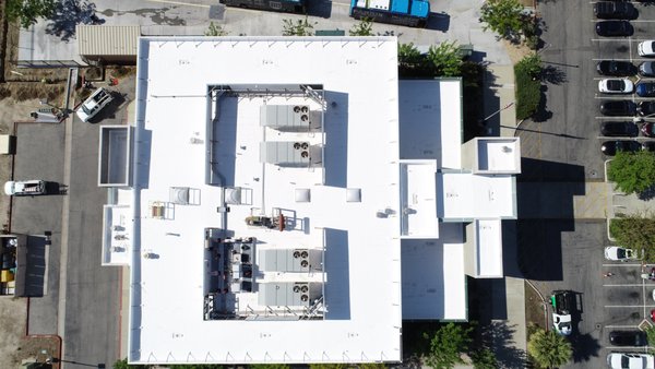 South Valley Medical Center Reroof - This project chose to go with a silicone coating restoration system from Everest Systems. Everest’s Silkoxy silicone roof coatings are an integral part of our ‘systems-based’ approach, providing a watertight seal that greatly reduces the harmful expansion and contraction of any roof by reducing surface temperatures by up to 80 degrees. The result? An energy-efficient, lightweight, seamless membrane that not only waterproofs but also saves money.
Everest’s Silkoxy silicone roof coatings systems provide more than just superior protection and financial savings—they offer peace of mind. Everest offers warranties up to 20 years, our systems are built to last, requiring lower maintenance and offering long-term performance. When we apply coating systems we deliver long-term solutions and excellent roof protection, because we believe in the value of our methods—and so do our customers. South Valley Medical Center Reroof - This project chose to go with a silicone coating restoration system from Everest Systems. Everest’s Silkoxy silicone roof coatings are an integral part of our ‘systems-based’ approach, providing a watertight seal that greatly reduces the harmful expansion and contraction of any roof by reducing surface temperatures by up to 80 degrees. The result? An energy-efficient, lightweight, seamless membrane that not only waterproofs but also saves money.
Everest’s Silkoxy silicone roof coatings systems provide more than just superior protection and financial savings—they offer peace of mind. Everest offers warranties up to 20 years, our systems are built to last, requiring lower maintenance and offering long-term performance. When we apply coating systems we deliver long-term solutions and excellent roof protection, because we believe in the value of our methods—and so do our customers.