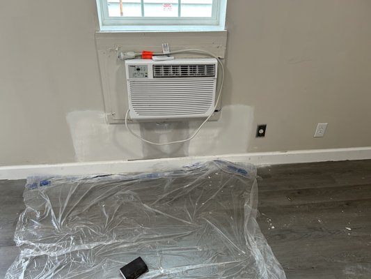 Small water leak - There was a small water leak under the air conditioner so we removed the drywall, fixed the water problem, hung, finished the drywall and painted