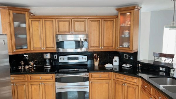 Cabinets before and after - No need for new cabinets. We make them like new. Call us today .