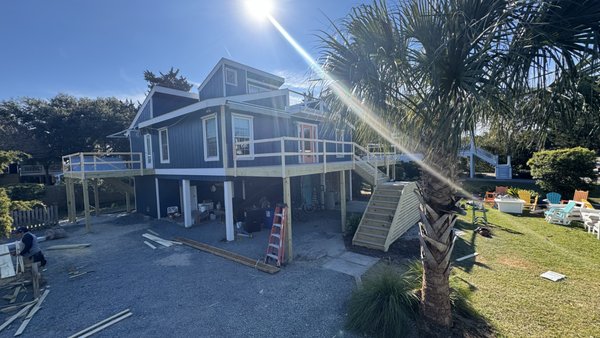 Deck demo+install and composite decking install. - This project was subcontracted to us from a local builder. We set with demoing the old wood decking, handrails, and deck frame. Framed from new posts up, installed composite Trex deck with grooves for hidden fasteners, and also added a nice detail with 1x4 going from stringer to stringer under the landing. Deck demo+install and composite decking install. - This project was subcontracted to us from a local builder. We set with demoing the old wood decking, handrails, and deck frame. Framed from new posts up, installed composite Trex deck with grooves for hidden fasteners, and also added a nice detail with 1x4 going from stringer to stringer under the landing.