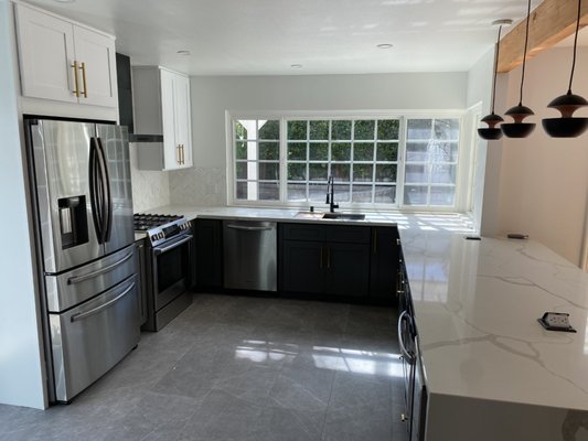 2022 WHOLE HOUSE REMODEL-WLV - The style of this house was very ... eclectic ... and the new owners wanted something more open and modern. We opened up the space to the kitchen and added a peninsula where the wall once was. This created the large open-concept space that the client was looking for. New flooring, paint (after a lot of horse-specific wallpaper removal), simple modern railings, updated fireplace, shaker-style kitchen cabinets, quartz countertops, updated electrical - it's a brand new space! 2022 WHOLE HOUSE REMODEL-WLV - The style of this house was very ... eclectic ... and the new owners wanted something more open and modern. We opened up the space to the kitchen and added a peninsula where the wall once was. This created the large open-concept space that the client was looking for. New flooring, paint (after a lot of horse-specific wallpaper removal), simple modern railings, updated fireplace, shaker-style kitchen cabinets, quartz countertops, updated electrical - it's a brand new space!