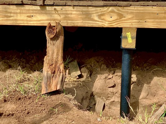 Out With The Old And In With The New! - In the photos you can see the original “block” and “post” piers that were utilized during the original construction (1940’s) of the home. This is a direct cause of foundation failure and should be addressed immediately.
We installed our metal bracket piers to provide a permanent solution to this homes foundation issues. Out With The Old And In With The New! - In the photos you can see the original “block” and “post” piers that were utilized during the original construction (1940’s) of the home. This is a direct cause of foundation failure and should be addressed immediately.
We installed our metal bracket piers to provide a permanent solution to this homes foundation issues.