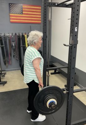 86 Year Old Deadlift - Corki, age 86 has been training for 3 months. Her deadlift is now up to 100lbs. She has less back pain and is able to get around much better with her stronger self! If she can do it, you can do it. 86 Year Old Deadlift - Corki, age 86 has been training for 3 months. Her deadlift is now up to 100lbs. She has less back pain and is able to get around much better with her stronger self! If she can do it, you can do it.