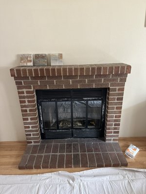 Fireplace remodeling - This remodel was done on an old fireplace. The owner was not satisfied with the old Look of the bricks so we replaced the bricks with real stone panels and update the Hearth from bricks to beautiful marble. Fireplace remodeling - This remodel was done on an old fireplace. The owner was not satisfied with the old Look of the bricks so we replaced the bricks with real stone panels and update the Hearth from bricks to beautiful marble.