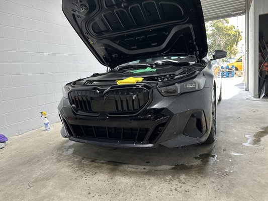 2024 BMW i5 in for front bumper paint protection - This customer with a 2024 BMW i5 has a matte factory finish on it. To avoid any future costly repairs he chose to protect it with out STEK DynoMatte paint protection film. Call now or message us to protect your investment!