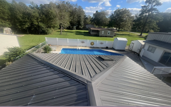 Metal Roof Installations - Our metal roofing solutions provide durability and aesthetic appeal, ensuring long-lasting protection for your home. We use the highest quality materials and skilled craftsmanship to offer roofing that withstands the elements. Metal Roof Installations - Our metal roofing solutions provide durability and aesthetic appeal, ensuring long-lasting protection for your home. We use the highest quality materials and skilled craftsmanship to offer roofing that withstands the elements.