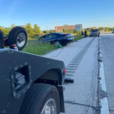 Recovering - The guys recovering a Chevy Impala from I-43. As always working hard. Recovering - The guys recovering a Chevy Impala from I-43. As always working hard.