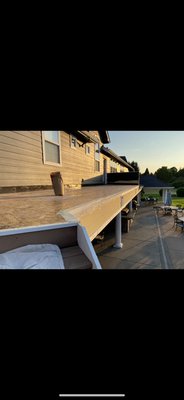 Outdoor deck with epoxy waterproofing - This deck remodel had a few phases to it, the GC had put together the deck making it easy for us to come in and lay out the  Epoxy waterproofing utilizing a Silikia product which can easily save clients numerous amounts of money over the years.