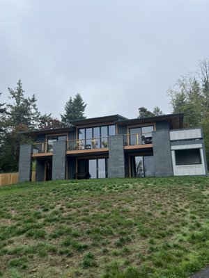 Exterior Painting Camano Island - This home was built 5 years ago. You might be curious as to why the customer got his house painted so soon. The reason is because many builders use inexpensive paint products like caulking, stains, and the paint itself. This leads to premature water intrusion and color fade. With our paint job, using premium products this paint job is sure to last for the next 10-15 years. Exterior Painting Camano Island - This home was built 5 years ago. You might be curious as to why the customer got his house painted so soon. The reason is because many builders use inexpensive paint products like caulking, stains, and the paint itself. This leads to premature water intrusion and color fade. With our paint job, using premium products this paint job is sure to last for the next 10-15 years.