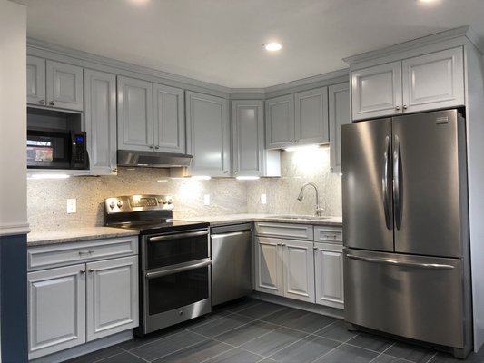 Kitchen remodel - Fully gutted old kitchen, new drywall, painting trim, all refurbished appliances, granite countertop and backsplash with led lights under wall cabinetry, updated all electrical wiring and fixtures on walls and ceilings.