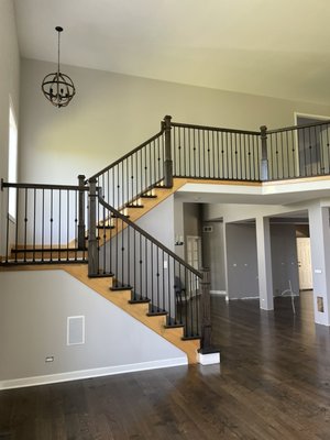 New stair posts, handrails, iron spindles - Customer had new white oak flooring installed throughout the house and new white oak posts, handrails + iron spindles New stair posts, handrails, iron spindles - Customer had new white oak flooring installed throughout the house and new white oak posts, handrails + iron spindles