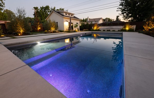 Luxury Outdoor Living - Custom swimming pool and ADU in Sacramento. Includes luxury outdoor living space and water feature. Luxury Outdoor Living - Custom swimming pool and ADU in Sacramento. Includes luxury outdoor living space and water feature.