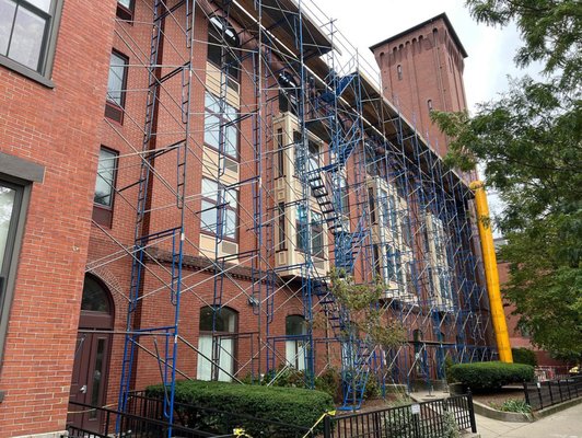 Asphalt Shingle Install in Boston - A difficult project due to the proximity to a busy Boston Road, the team built a scaffolding Asphalt Shingle Install in Boston - A difficult project due to the proximity to a busy Boston Road, the team built a scaffolding