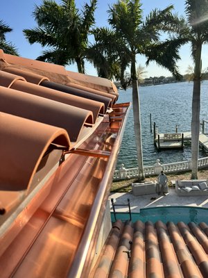 7" Solid Copper Seamless Gutters - This project features the installation of 7” solid copper gutters, providing exceptional durability, efficient water management, and a beautiful natural finish. Over time, copper develops a unique patina that enhances the character of the home. 7" Solid Copper Seamless Gutters - This project features the installation of 7” solid copper gutters, providing exceptional durability, efficient water management, and a beautiful natural finish. Over time, copper develops a unique patina that enhances the character of the home.
