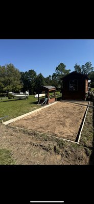 Boat parking area and sidewalk to shed - The customer wanted a nice area to be able to park his boat on and not have to worry about it cracking. We poured.A 12x30 slab at 5 inches thick so he will never have to worry about it cracking and it gives him plenty of room to park his boat. We also included a sidewalk that connects into his shed for easy access getting Boating equipment in and out of his shed to his boat. The customer was very happy with the final product and is having us pour another big slab for him soon. Boat parking area and sidewalk to shed - The customer wanted a nice area to be able to park his boat on and not have to worry about it cracking. We poured.A 12x30 slab at 5 inches thick so he will never have to worry about it cracking and it gives him plenty of room to park his boat. We also included a sidewalk that connects into his shed for easy access getting Boating equipment in and out of his shed to his boat. The customer was very happy with the final product and is having us pour another big slab for him soon.