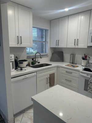 Isabelle Kitchen Remodel - As you can see from the photos, a kitchen does not need to be large to be gorgeous and up to date. This kitchen was out of date and the cabinets had a moldy smell before we took on this project. After 3 weeks in total, Isabelle had the kitchen she always wanted for her and her husband. They were an absolute pleasure to work with and we hope to share the same experience with you. Give us a call and let us give you a free quote today.