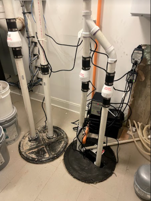 Sump Pump & Ejector Pump Replacement with Battery Backup - Roscoe Village, Chicago, IL - May, 2021 - This job was completed in the Roscoe Village neighborhood of Chicago Illinois.  The customer called in the late evening hours frantic stating that he was having water coming into his basement and he did not know what to do.  We told him luckily, we had a plumber in the area and that he would arrive in about 30 minutes.  The plumber arrived earlier than expected.  The plumber ran a diagnostic to find out the origin of where the water was coming from in the basement.  The plumber found that the ejector pump had failed and also 2 sump pumps had failed in the basement.  Most of the water was coming from the failed ejector pump.


This customer had recently moved from Los Angeles California to the Roscoe Village neighborhood of Chicago Illinois.  He had never heard of a sump pump or ejector pump before.  He said that in California they do not have basements.  If they have no basements then they would have no need for sump pumps or ejector pumps.  In the Chicago Land area we have basements.  


When a basement is installed, drain tile is installed around the basement foundation to collect all the water around the foundation.  Then this water is routed to a sump pit where a sump pump is waiting for it.   Then the sump pump sends this water away from the property.  This is very important because water will eventually eat through a basement foundation if this happens water damage can occur in the basement.  


Many homes in the Chicagoland area have ejector pumps installed in the basement.  Ejector pumps are different than sump pumps because they can grind solids for the purpose of taking on sewage and pumping upwards from the basement into the main building sewer.   
In this case the ejector pump and the 2 sump pumps had failed due to age and neglect.  The customer just was not aware they even existed.  

The Plumber first replaced the ejector pump so that most of the water intruding in the basement would be expelled.  Then the plumber asked the customer if the power had ever gone out during a storm.  Immediately the customer responded yes.  So then we replaced both his sump pumps and installed a battery back up system for each sump pump so that if the power did go out during a storm he would be protected from flooding.  This customer was happy that we Rescued him from his basement plumbing.  Call us today at 773-799-8848 and we can Rescue you from your basement plumbing too.