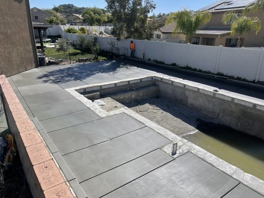 Pool Deck 2023 - This pool deck was completed in early 2023, we also completed a driveway extension and decorative steps in the front of the home to finish the hardscape features for this family.