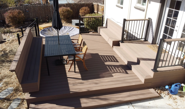 Composite deck with built-in seating - A beautiful composite deck with built-in seating makes your space easy to maintain and offers lots of seating options to make hosting a breese, year-round. Composite deck with built-in seating - A beautiful composite deck with built-in seating makes your space easy to maintain and offers lots of seating options to make hosting a breese, year-round.