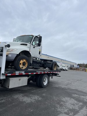 Tractor Towing - Towing a medium duty tractor. Tractor Towing - Towing a medium duty tractor.