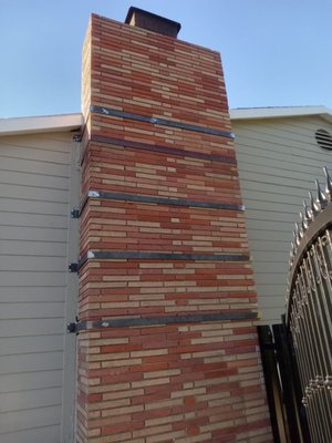 Chimney Bracing - This chimney was leaning, so to prevent it from further moving we braced the chimney to the home to minimize the leaning. Chimney Bracing - This chimney was leaning, so to prevent it from further moving we braced the chimney to the home to minimize the leaning.
