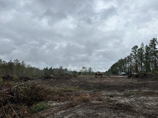 Land clearing 10 acre parcel and grading for 96x36 ft pole barn garage in progress - This is ongoing land clearing of a 10 acre parcel. Grading for 96x36 pole barn garage in progress Land clearing 10 acre parcel and grading for 96x36 ft pole barn garage in progress - This is ongoing land clearing of a 10 acre parcel. Grading for 96x36 pole barn garage in progress