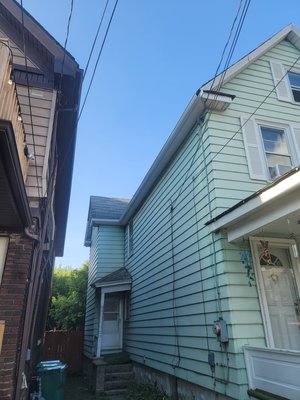 niagara falls full replacement - The house needed a complete reconstruction of the gutters. The Fascia was rotted out and needed to be replaced. More than half of the rafter tails needed support. Some areas received new soffit. Finished the new gutters with gutter guards. niagara falls full replacement - The house needed a complete reconstruction of the gutters. The Fascia was rotted out and needed to be replaced. More than half of the rafter tails needed support. Some areas received new soffit. Finished the new gutters with gutter guards.