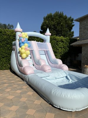 Our all new Sugar Splash waterslide! - This Pastel beauty sits at 12 ft height and 21 ft length! Comes with a slide and a pool ! Our all new Sugar Splash waterslide! - This Pastel beauty sits at 12 ft height and 21 ft length! Comes with a slide and a pool !