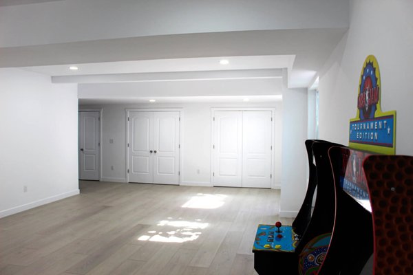 E Midvale, Utah - Soul Builders transformed this basement into a bright, modern living space! With sleek finishes, recessed lighting, and a spacious layout, it’s perfect for both relaxation and entertainment. The hallway leads to well-designed rooms, while the bathroom boasts a luxurious double vanity with LED mirrors. From start to finish, this remodel brought new life to a previously underused space! E Midvale, Utah - Soul Builders transformed this basement into a bright, modern living space! With sleek finishes, recessed lighting, and a spacious layout, it’s perfect for both relaxation and entertainment. The hallway leads to well-designed rooms, while the bathroom boasts a luxurious double vanity with LED mirrors. From start to finish, this remodel brought new life to a previously underused space!