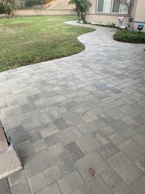 BACKYARD PAVERS - Revitalize your backyard with the enduring charm of pavers. Whether for walkways or accentuating your landscape, these versatile stones offer both aesthetic appeal and robust durability, ensuring long-lasting enjoyment for your outdoor spaces.

Choosing walkway pavers opens up a world of design possibilities. From intricate patterns to classic styles, these stones provide the perfect finishing touch to your yard, seamlessly blending functionality with beauty. With customization options to fit any yard size or aesthetic preference, walkway pavers offer a tailored solution for your outdoor remodel.

Enhance your home's exterior with the subtle sophistication of walkway paver stones. Their enduring elegance and low maintenance make them an ideal choice for transforming your outdoor environment into a welcoming retreat.