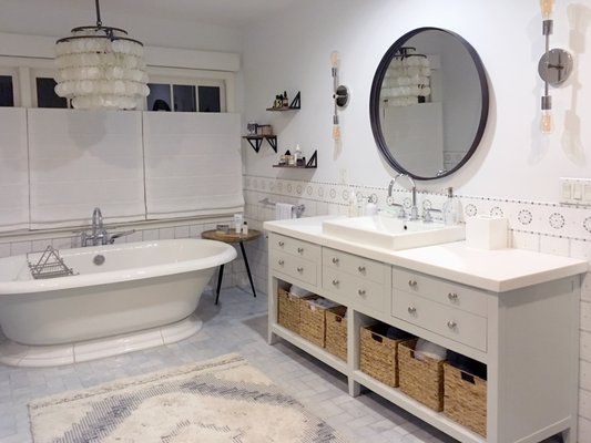 Pacific Palicades Master Bathroom Refresh - This bathroom went from dark and masculine to light, fresh, and feminine! The bones of the room (tile, vanities) were existing, but Shana transformed the look by painting the dark wood vanities a pale gray color, changing all the hardware, and adding new mirrors and sconces. The lux bohemian accessories took it all the way to a glam oasis. Pacific Palicades Master Bathroom Refresh - This bathroom went from dark and masculine to light, fresh, and feminine! The bones of the room (tile, vanities) were existing, but Shana transformed the look by painting the dark wood vanities a pale gray color, changing all the hardware, and adding new mirrors and sconces. The lux bohemian accessories took it all the way to a glam oasis.