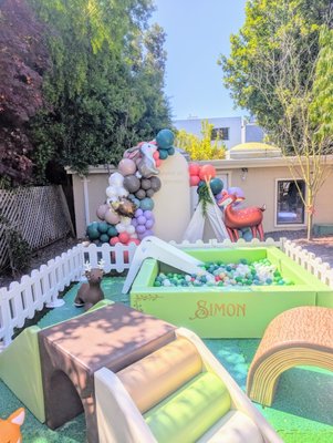 Woodland party - Custom balloon displays, backdrop, coordinating play area, and table decor.