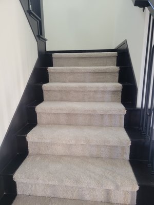 Shaw Carpet Installation - Irvine Residence - For this Irvine home, we installed 170 yards of high-quality Shaw carpet (Style: Rocking Horse). This full-service project included detailed work on a custom staircase and professional furniture moving to ensure a seamless finish. We used two rolls from the same dye lot to guarantee perfect color consistency throughout the first-floor bedroom, closet, and upstairs living areas. The result is a clean, modern look that elevates the entire home's aesthetic. Shaw Carpet Installation - Irvine Residence - For this Irvine home, we installed 170 yards of high-quality Shaw carpet (Style: Rocking Horse). This full-service project included detailed work on a custom staircase and professional furniture moving to ensure a seamless finish. We used two rolls from the same dye lot to guarantee perfect color consistency throughout the first-floor bedroom, closet, and upstairs living areas. The result is a clean, modern look that elevates the entire home's aesthetic.