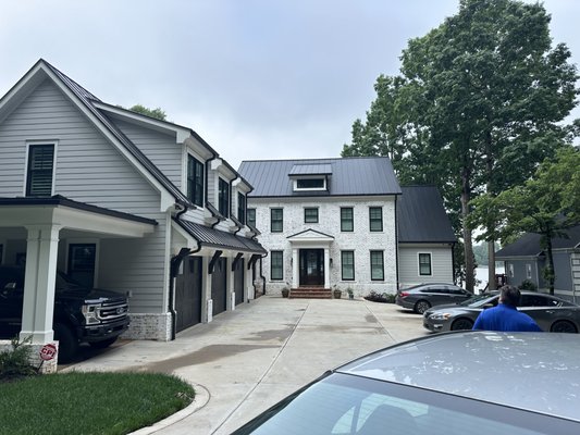 Gutter Protection Installation - This beautiful lakefront home needed a custom gutter protection system guaranteed to capture the water while eliminating routine gutter cleaning. Our rainwater management consultant designed the perfect system and the installation was completed within a week and now the family enjoys the peace-of-mind knowing the gutters are working as designed and the need for gutter cleaning has been eliminated.