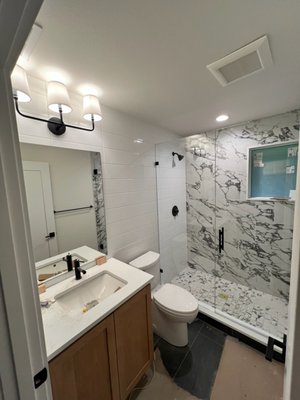 Custom Bathroom Glass Installation - This 3/8" Frameless enclosure and mirror were installed in a new construction to finish off this beautiful bathroom in the Kirkland area. Custom Bathroom Glass Installation - This 3/8" Frameless enclosure and mirror were installed in a new construction to finish off this beautiful bathroom in the Kirkland area.