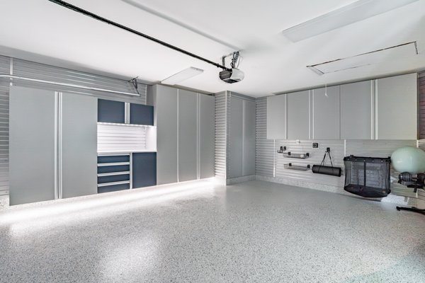 Slate Blue & Pewter Custom Garage Cabinet System with Polyaspartic Floor - Here's a long-form description for the project (about 600 words / ~4,000 characters) — editorial register, no discount language, credentials woven in:
Title: Complete Custom Garage System — Slate Blue & Pewter
Description:
This is what a garage looks like when every surface is considered. A full transformation by Premier Garage of South Florida, designed and installed as one cohesive system in a palette of slate blue and pewter — clean, modern, and built to perform for decades.
The cabinetry is the centerpiece. Floor-to-ceiling units engineered to float off the slab, mounted to the wall rather than resting on the floor. The benefit is more than visual: nothing traps moisture or debris underneath, the slab stays easy to clean, and the entire run reads as one uninterrupted architectural line. Doors and drawer fronts are finished in a deep slate blue with integrated aluminum pulls — no protruding hardware to catch on, just a continuous edge that opens with a fingertip. The drawers are full-extension and heavy-duty, gliding smoothly to the very back so nothing gets lost in the dark. A quartz-look worktop anchors the center bay, with an LED-lit slatwall backsplash that turns the work zone into something closer to a studio than a storage closet.
Surrounding the cabinetry is a full-wall slatwall system — the quiet workhorse of the whole design. Tools, sports gear, fitness equipment, and seasonal items all come off the floor and onto the wall, held by modular baskets and hooks that reposition in seconds. Needs change; the wall changes with them. A bike that lived in the corner last year becomes a row of paddleboards this year, and nothing has to be drilled or rebuilt. Everything stays visible, reachable, and orderly.
Underfoot is a sealed polyaspartic floor coating, applied in a custom chip blend that hides dust and wear while adding traction. Polyaspartic is the upgrade over standard epoxy: it cures faster, resists UV yellowing, and shrugs off the things that destroy a garage floor — hot tires, dropped tools, road salt, oil, and the harsh chemicals that find their way into every working garage. The finish is seamless and non-porous, so spills wipe up instead of soaking in, and the surface stays bright for years rather than chalking and peeling.
What ties it all together is the discipline of a system designed as a whole rather than assembled from parts. The cabinet color, the slatwall, the floor chip, the lighting — all selected to work in concert. That's the difference between a garage that has storage and a garage that feels designed.
Every Premier Garage project is custom-designed to the room and the way you actually live in it, then professionally installed by our own experienced team — not subcontracted out. We've been doing this in South Florida since 2006, more than twenty years, and we're the #1 Premier Garage franchise dealer in the United States and #2 in sales and design nationwide. We carry $2M in liability insurance, hold an A+ rating with the BBB and full accreditation, and maintain a 4.9-star average across more than 216 Google reviews. Every system we build is backed by our lifetime warranty.
The difference lives in the details — in the float of a cabinet, the glide of a drawer, the way a floor still looks new after a decade of hard use.
If you're ready to see what your own garage could become, we'd love to show you. Free in-home design consultation, no pressure — just ideas, measurements, and an honest plan. Call (954) 797-9275 or visit us at 450 NW 27th Ave, Fort Lauderdale.
Premier Garage · The Tailored Closet of South Florida. Slate Blue & Pewter Custom Garage Cabinet System with Polyaspartic Floor - Here's a long-form description for the project (about 600 words / ~4,000 characters) — editorial register, no discount language, credentials woven in:
Title: Complete Custom Garage System — Slate Blue & Pewter
Description:
This is what a garage looks like when every surface is considered. A full transformation by Premier Garage of South Florida, designed and installed as one cohesive system in a palette of slate blue and pewter — clean, modern, and built to perform for decades.
The cabinetry is the centerpiece. Floor-to-ceiling units engineered to float off the slab, mounted to the wall rather than resting on the floor. The benefit is more than visual: nothing traps moisture or debris underneath, the slab stays easy to clean, and the entire run reads as one uninterrupted architectural line. Doors and drawer fronts are finished in a deep slate blue with integrated aluminum pulls — no protruding hardware to catch on, just a continuous edge that opens with a fingertip. The drawers are full-extension and heavy-duty, gliding smoothly to the very back so nothing gets lost in the dark. A quartz-look worktop anchors the center bay, with an LED-lit slatwall backsplash that turns the work zone into something closer to a studio than a storage closet.
Surrounding the cabinetry is a full-wall slatwall system — the quiet workhorse of the whole design. Tools, sports gear, fitness equipment, and seasonal items all come off the floor and onto the wall, held by modular baskets and hooks that reposition in seconds. Needs change; the wall changes with them. A bike that lived in the corner last year becomes a row of paddleboards this year, and nothing has to be drilled or rebuilt. Everything stays visible, reachable, and orderly.
Underfoot is a sealed polyaspartic floor coating, applied in a custom chip blend that hides dust and wear while adding traction. Polyaspartic is the upgrade over standard epoxy: it cures faster, resists UV yellowing, and shrugs off the things that destroy a garage floor — hot tires, dropped tools, road salt, oil, and the harsh chemicals that find their way into every working garage. The finish is seamless and non-porous, so spills wipe up instead of soaking in, and the surface stays bright for years rather than chalking and peeling.
What ties it all together is the discipline of a system designed as a whole rather than assembled from parts. The cabinet color, the slatwall, the floor chip, the lighting — all selected to work in concert. That's the difference between a garage that has storage and a garage that feels designed.
Every Premier Garage project is custom-designed to the room and the way you actually live in it, then professionally installed by our own experienced team — not subcontracted out. We've been doing this in South Florida since 2006, more than twenty years, and we're the #1 Premier Garage franchise dealer in the United States and #2 in sales and design nationwide. We carry $2M in liability insurance, hold an A+ rating with the BBB and full accreditation, and maintain a 4.9-star average across more than 216 Google reviews. Every system we build is backed by our lifetime warranty.
The difference lives in the details — in the float of a cabinet, the glide of a drawer, the way a floor still looks new after a decade of hard use.
If you're ready to see what your own garage could become, we'd love to show you. Free in-home design consultation, no pressure — just ideas, measurements, and an honest plan. Call (954) 797-9275 or visit us at 450 NW 27th Ave, Fort Lauderdale.
Premier Garage · The Tailored Closet of South Florida.