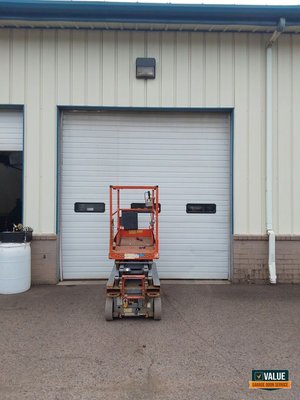 Torsion System Reset in Clackamas, OR - Value Garage Door Service completed a torsion system reset in Clackamas, OR, using a scissor lift to safely access and service the commercial door system. Torsion System Reset in Clackamas, OR - Value Garage Door Service completed a torsion system reset in Clackamas, OR, using a scissor lift to safely access and service the commercial door system.