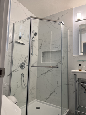 Shower Remodeling - New wall and floor tiles, glass door, and fixtures
