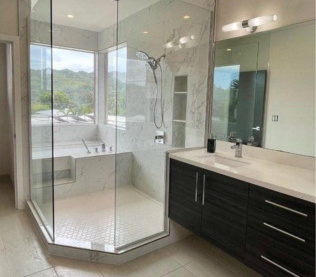 Bathroom Remodel - This shower remodel completely transformed the bathroom into a modern, spa-like retreat. We installed a frameless glass enclosure for a sleek and open feel, paired with elegant tile work that enhances both durability and style. The new fixtures were carefully chosen for a clean, contemporary look while providing excellent functionality. With improved lighting and a more spacious layout, the shower now feels bright, luxurious, and inviting. The homeowners are thrilled with the result and love starting and ending their day in this refreshed space! Bathroom Remodel - This shower remodel completely transformed the bathroom into a modern, spa-like retreat. We installed a frameless glass enclosure for a sleek and open feel, paired with elegant tile work that enhances both durability and style. The new fixtures were carefully chosen for a clean, contemporary look while providing excellent functionality. With improved lighting and a more spacious layout, the shower now feels bright, luxurious, and inviting. The homeowners are thrilled with the result and love starting and ending their day in this refreshed space!