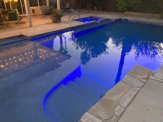 Swimming Pool Remodel - This pool had a major leak problem with tons of cracks. The pool floor and the spa wall had disintegrated. By raising the floor, adding a Baja bench and Rebuilding the spa wall we were able to bring this pool back to life.  Super satisfied with the results!!!