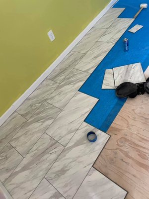 Laminated Floor - In this project we removed the carpet floor ant install the new laminated floor and little trim .