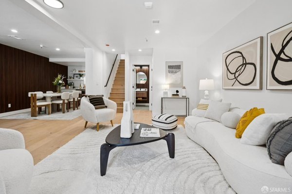 San Francisco Home Staging - Living room staged with Roche Bobois coffee table alone with the feature wall, lined with vertical wood slats- White Harmony Staging creates a warm yet structured backdrop that instantly elevates the space. Against it, a striking credenza with arched black paneling and brass hardware becomes the focal point—its contemporary lines echoing both strength and refinement❤️ San Francisco Home Staging - Living room staged with Roche Bobois coffee table alone with the feature wall, lined with vertical wood slats- White Harmony Staging creates a warm yet structured backdrop that instantly elevates the space. Against it, a striking credenza with arched black paneling and brass hardware becomes the focal point—its contemporary lines echoing both strength and refinement❤️