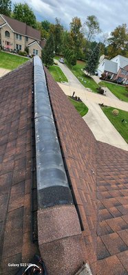 Wind storm damage…. Fixed - Wind damage took off ridge caps.. so we fixed it all new again.