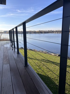 Prior lake custom cable railings. - Railings made to adhere to all code requirements while giving the home owner maximum lake visibility. Our railings are custom made for each deck/stairway making each piece one of a kind.