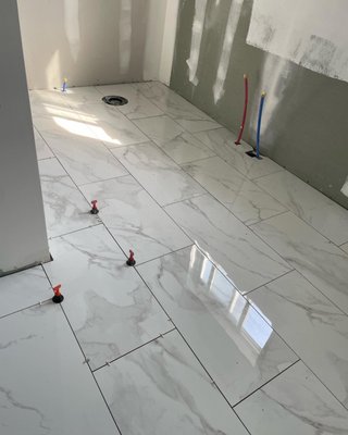 Custom Tiling - Our team provides custom tiling solutions - from floors to kitchen backsplash to refreshed shower stalls, we do it all! Call us today to discuss your home projects! Custom Tiling - Our team provides custom tiling solutions - from floors to kitchen backsplash to refreshed shower stalls, we do it all! Call us today to discuss your home projects!