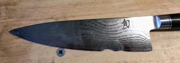 Japanese Chefs Knife Repair - This Japanese Chefs Knife had a huge chip in the blade. It was about 1 inch long & half inch deep. It was repaired & sharpened better than new. Japanese Chefs Knife Repair - This Japanese Chefs Knife had a huge chip in the blade. It was about 1 inch long & half inch deep. It was repaired & sharpened better than new.