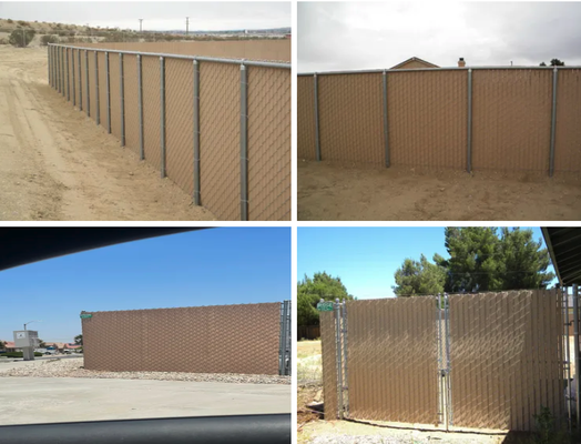 Privacy Chain Link - One of our most popular styles is our
reinforced privacy fence that has per-woven slats. The fence is available in a wide range of heights, coated, and non coated wire. Great for residential as well as commercial and industrial property protection. These fences are very durable and requires little maintenance. This type of fencing is 98% p Privacy Chain Link - One of our most popular styles is our
reinforced privacy fence that has per-woven slats. The fence is available in a wide range of heights, coated, and non coated wire. Great for residential as well as commercial and industrial property protection. These fences are very durable and requires little maintenance. This type of fencing is 98% p