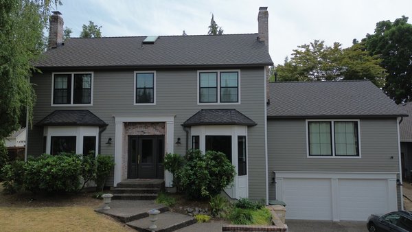 Full Siding Replacement & Paint - Completed in mid-June 2026, this full exterior transformation gave this home a fresh, modern appearance while significantly improving its durability and curb appeal. The project included a complete siding replacement using James Hardie CedarMill Select siding, custom trim installation to enhance the home's architectural details, and a professional exterior paint finish with Sherwin-Williams SuperPaint.
By replacing the aging siding and updating the trim and color scheme, the home now has a cleaner, more contemporary look that stands out while providing long-lasting protection from the Pacific Northwest weather. Every detail was carefully installed and finished to create a seamless, high-quality result that will continue to look beautiful for years to come.
This project is a great example of how new siding, custom trim, and a professional paint job can completely transform the appearance of a home while increasing its value, protection, and overall appeal. Full Siding Replacement & Paint - Completed in mid-June 2026, this full exterior transformation gave this home a fresh, modern appearance while significantly improving its durability and curb appeal. The project included a complete siding replacement using James Hardie CedarMill Select siding, custom trim installation to enhance the home's architectural details, and a professional exterior paint finish with Sherwin-Williams SuperPaint.
By replacing the aging siding and updating the trim and color scheme, the home now has a cleaner, more contemporary look that stands out while providing long-lasting protection from the Pacific Northwest weather. Every detail was carefully installed and finished to create a seamless, high-quality result that will continue to look beautiful for years to come.
This project is a great example of how new siding, custom trim, and a professional paint job can completely transform the appearance of a home while increasing its value, protection, and overall appeal.
