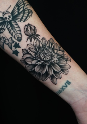Miss Vampira - Strong design and visuals skills paired with a deep rooted love for horror and pop culture have allowed her to develop a unique style. Her skills and passion have given her an opportunity to show off her work leaving every customer she tattoos happy and already thinking of their next tattoo with her!
