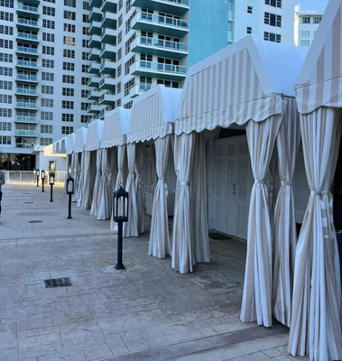 Miami Beach Cabanas - The Miami Beach Club Cabana Upgrade project involved creating a luxurious outdoor oasis by installing custom-made cabanas with high-quality millwork and certified outdoor upholstery, featuring Sunbrella fabric. The upgraded space offers members a stylish and comfortable retreat, elevating the club's prestige and attracting new patrons. Miami Beach Cabanas - The Miami Beach Club Cabana Upgrade project involved creating a luxurious outdoor oasis by installing custom-made cabanas with high-quality millwork and certified outdoor upholstery, featuring Sunbrella fabric. The upgraded space offers members a stylish and comfortable retreat, elevating the club's prestige and attracting new patrons.